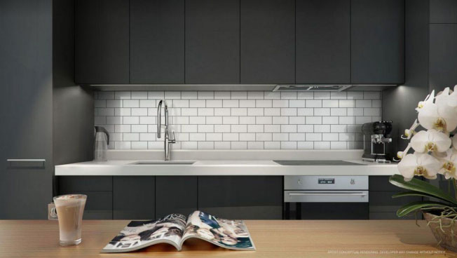 a modern-looking kitchen with dark, smooth cabinets and white subway tile backsplash.